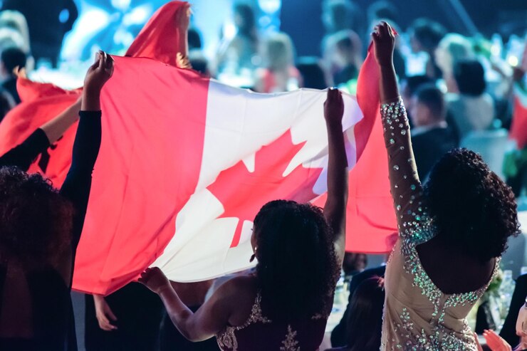 girls-international-event-are-cheering-their-country-raising-flag-canada_627281-2291